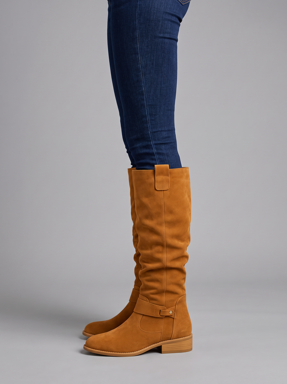 Women's tan suede knee-high wedge boots – side view