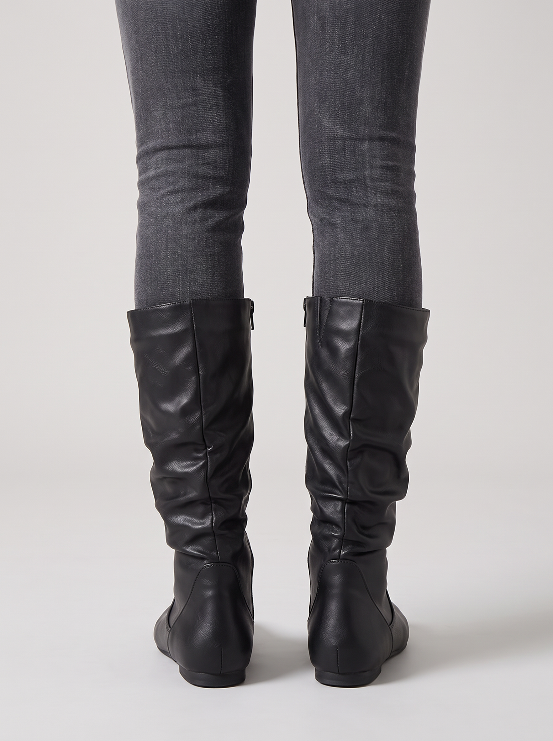 Women's Slouch Boots – Faux Leather Mid-Calf Flat Boots in Black – back view