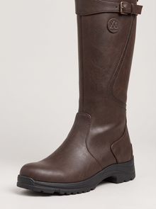 Women's Waterproof Knee High Boots with Lug Sole in Dark Brown – close-up of buckle strap and lug sole