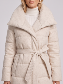 Women's Long Puffer Coat in Cream – close-up of quilting, collar and tie belt