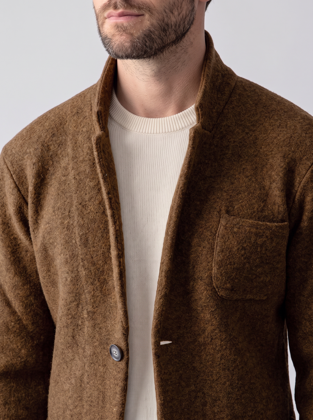 Men's Wool Jacket in Brown – close-up of stand collar, buttons and wool texture
