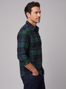 Blackwatch plaid flannel shirt with rolled sleeves, side view