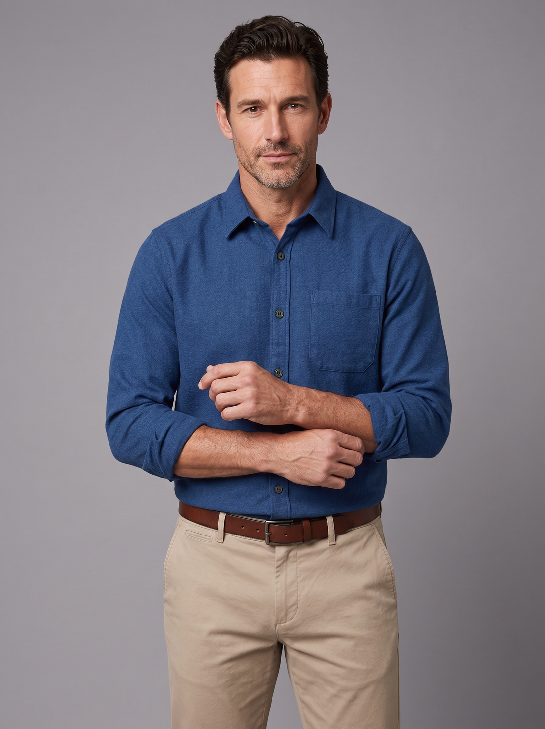 Man wearing a brook blue flannel shirt