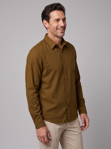 Man wearing a cordovan brown flannel shirt
