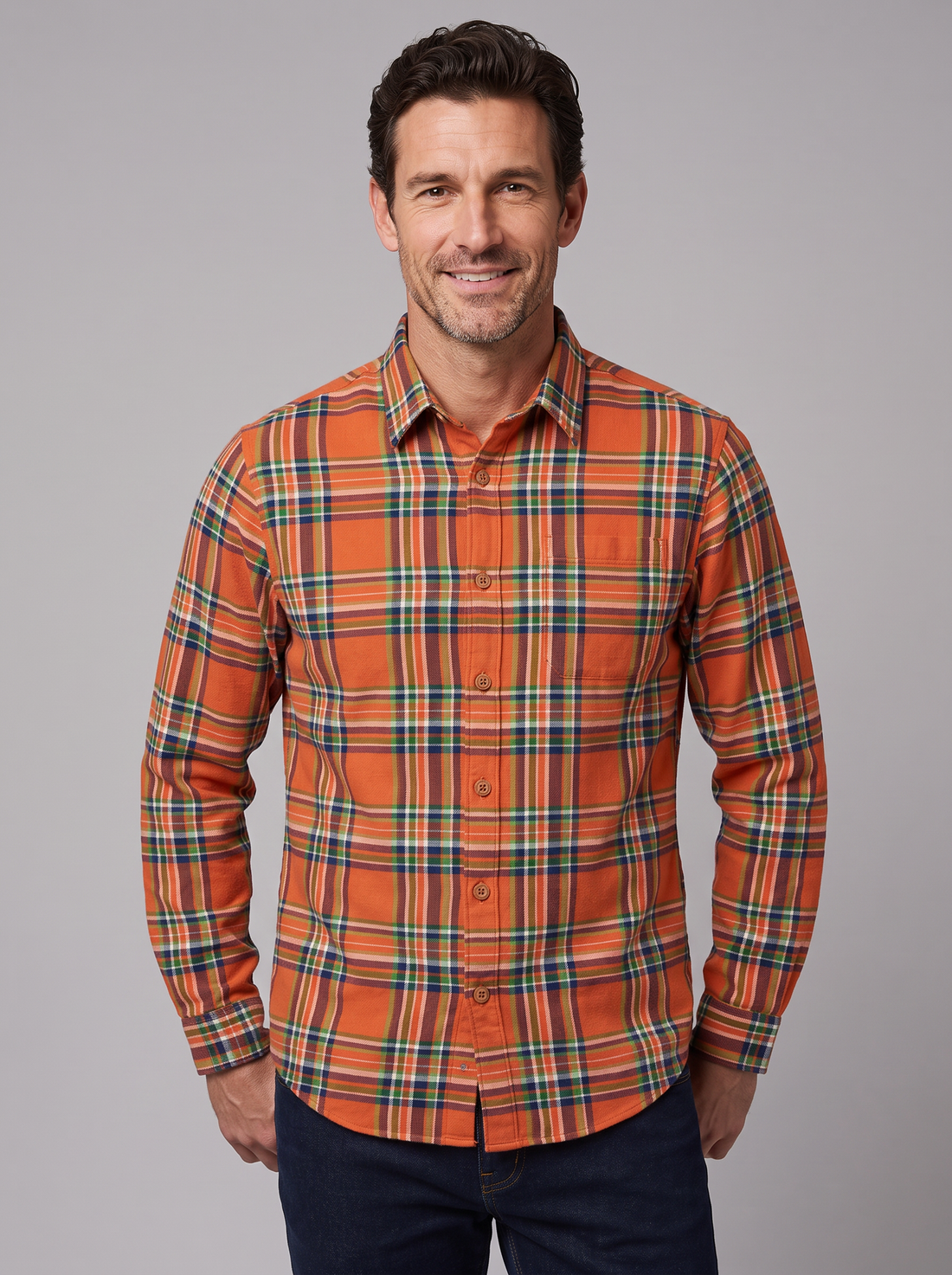 Man wearing a carrot orange plaid flannel shirt