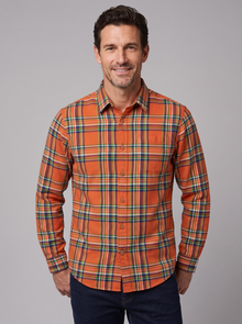Man wearing a carrot orange plaid flannel shirt