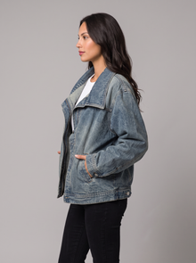 Side view of oversized high neck denim jacket