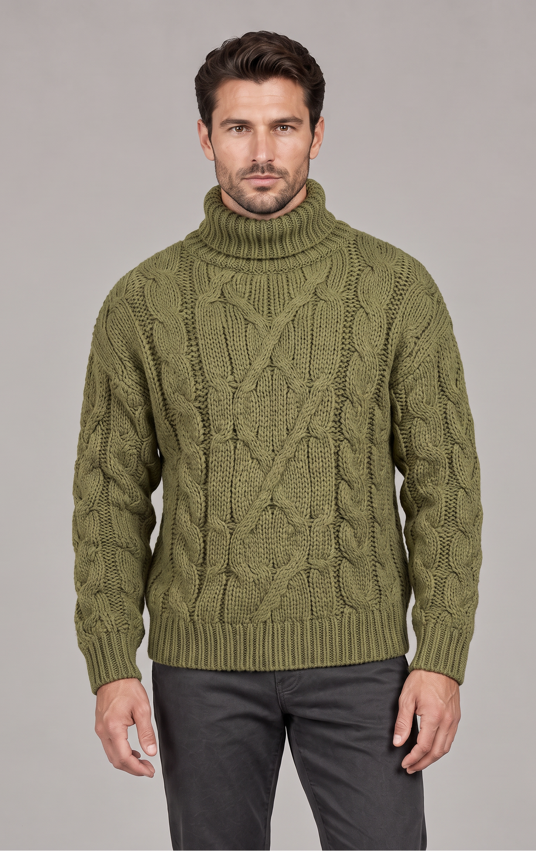 Man wearing olive green chunky cable knit roll neck jumper, front view