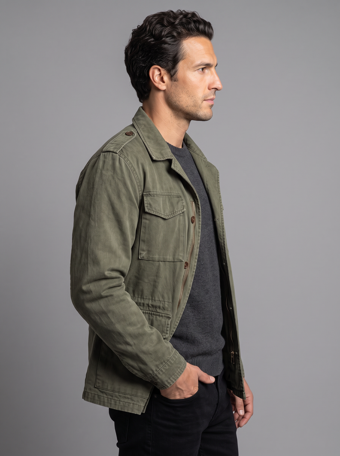 Side view of men's green field jacket with flap pockets