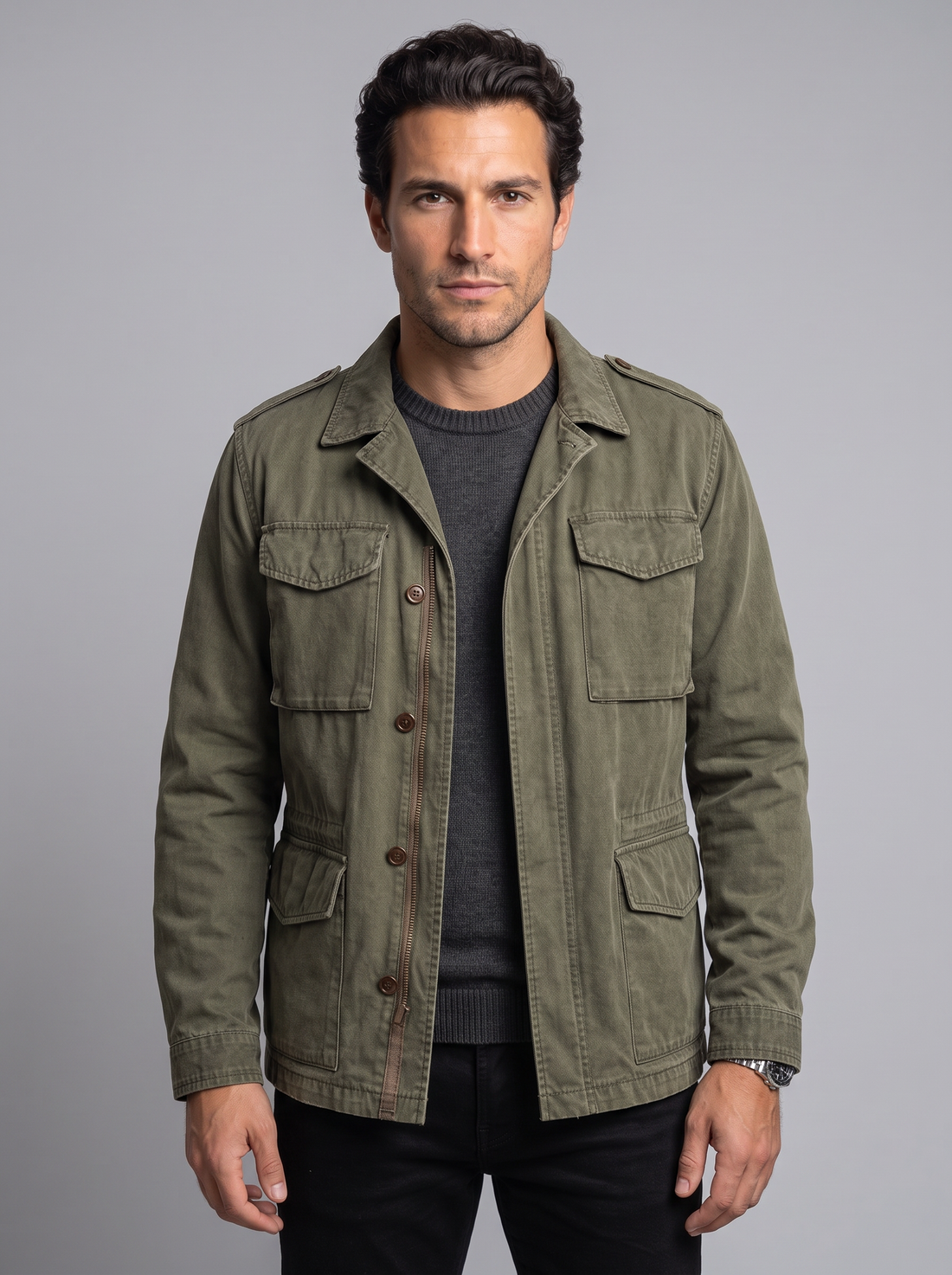 Man wearing olive green vintage military field jacket, front view