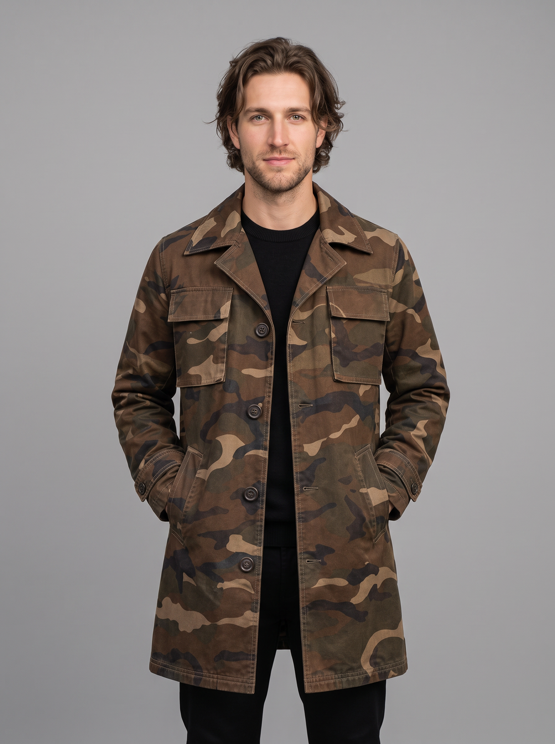 Man wearing brown camo cargo trench coat with flap chest pockets, front view