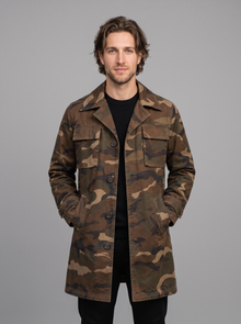 Man wearing brown camo cargo trench coat with flap chest pockets, front view