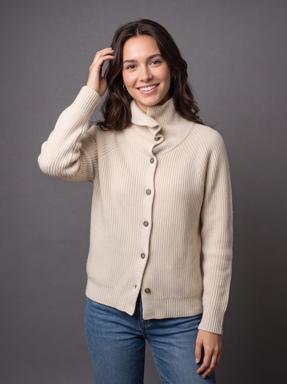 Woman wearing beige wool cashmere knit cardigan with funnel collar