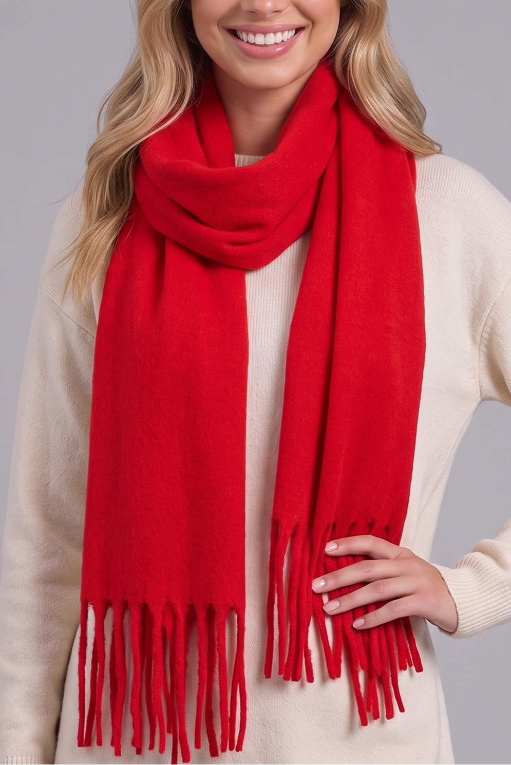 Woman wearing red tassel wrap scarf