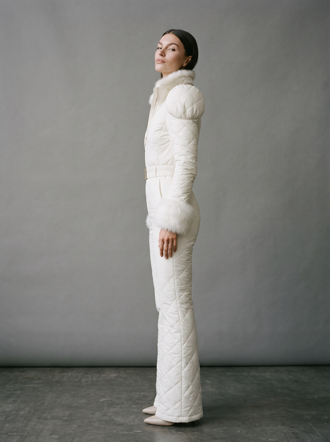 White quilted ski suit, side view
