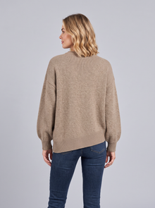 Back view of a brown cashmere knit jumper with plain back, balloon sleeves and curved hem