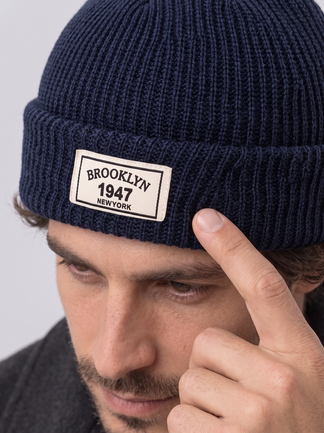 Men's Fisherman Beanie – rib knit, cuff and patch close-up