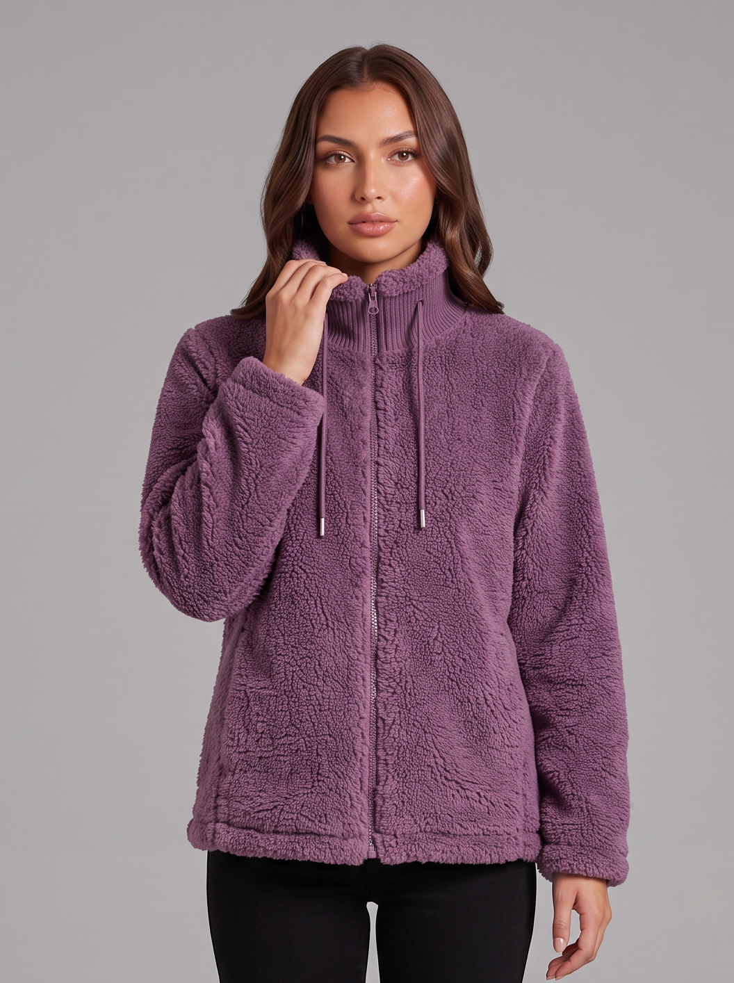 Purple teddy fleece zip jacket worn with black snow boots