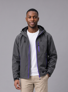 Grey hooded water-resistant windbreaker with beige chinos