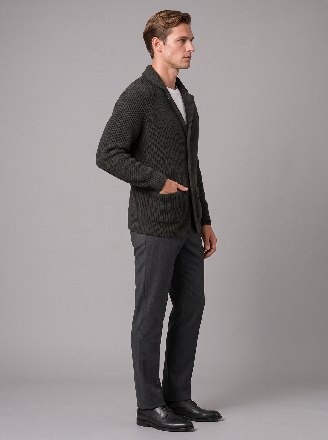 Men's charcoal ribbed knit cardigan, side view with hand in pocket