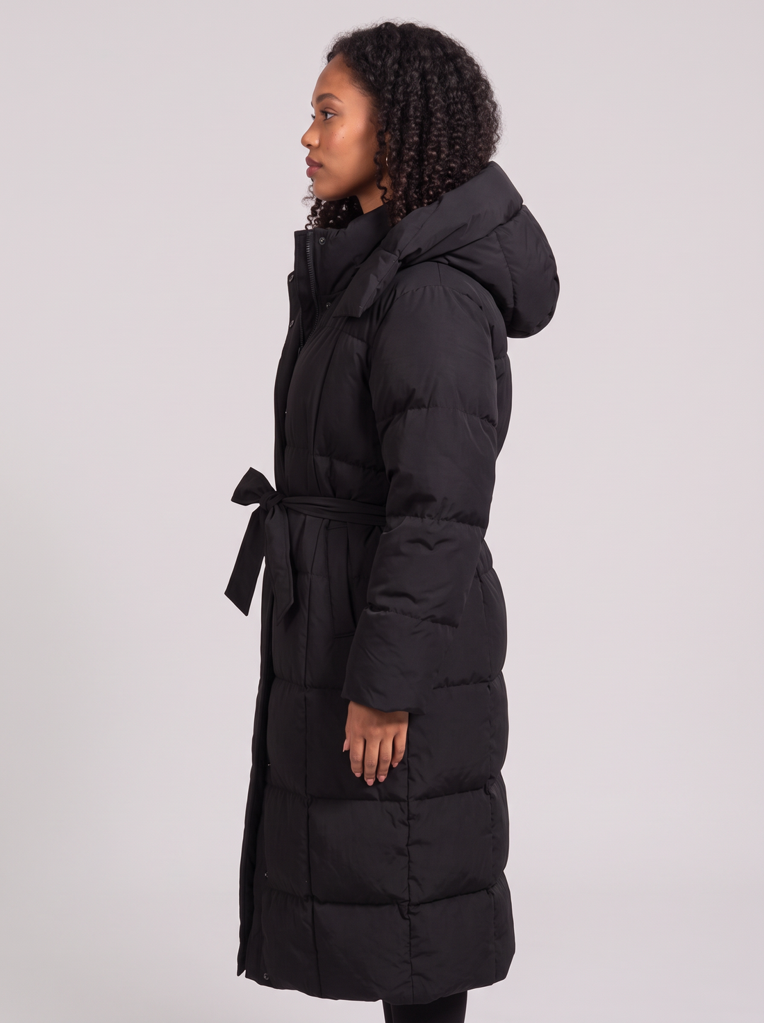 Women's Long Puffer Coat with Hood in Black – side view