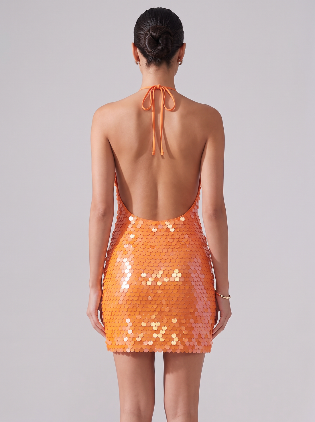 Women's Cowl Neck Sequin Mini Dress in Burnt Orange – back view, open back