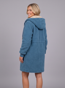 Women's longline hooded sherpa fleece jacket in blue – back view