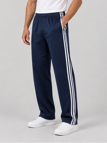 Men's navy relaxed fit tracksuit bottoms – three-quarter view