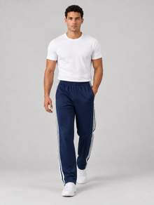 Men's navy relaxed fit tracksuit bottoms – walking view