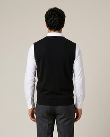 Men's black argyle knit sweater vest, back view