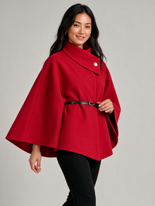 Montarello women's belted high neck cape in red, side walking view