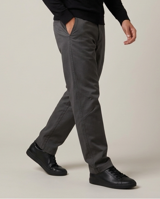 Men's grey tailored stretch tapered pants, front studio view