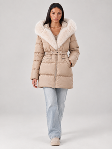 Women's beige faux fur hooded puffer jacket – studio walking view