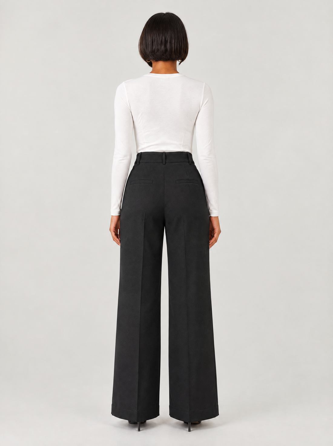 Women's black high-waisted work trousers – back view