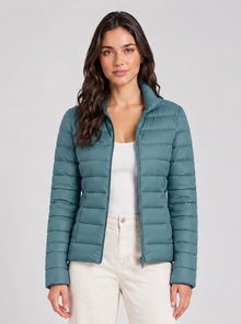 Women’s blue lightweight puffer jacket, front view