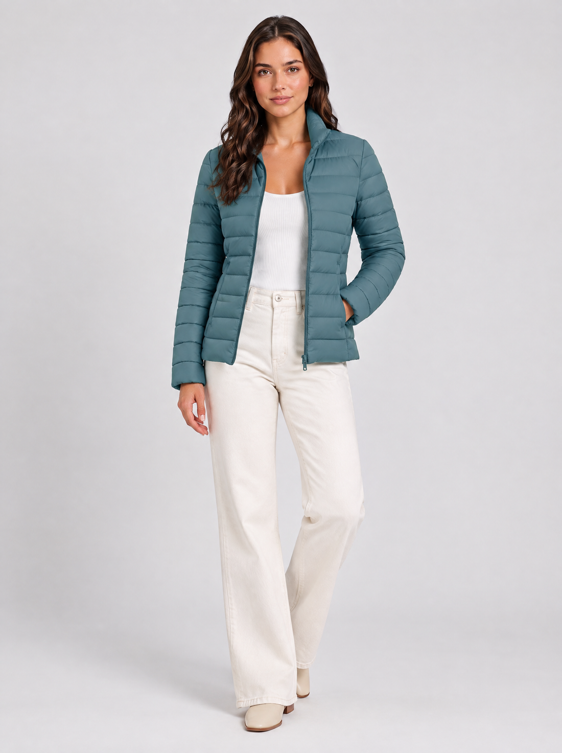 Women’s blue lightweight puffer jacket, front view